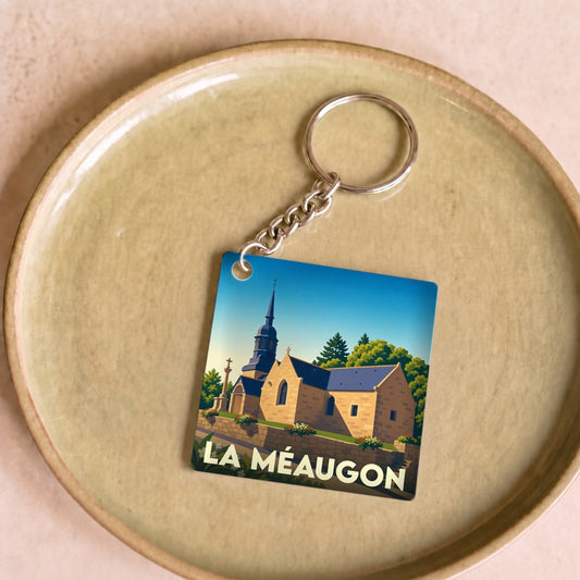 Porte-clés souvenir de la ville de La Méaugon avec une illustration stylisée de son église.