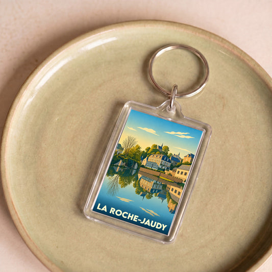 Porte-clés souvenir de la ville de La Roche-Jaudy avec une illustration stylisée.