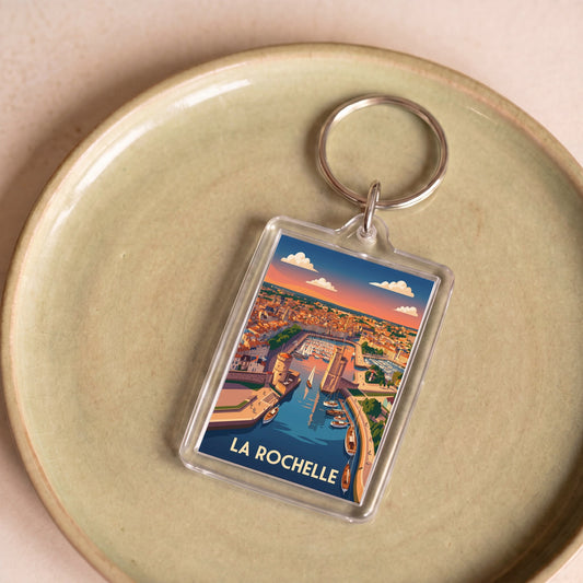 Porte-clés souvenir de la ville de La Rochelle avec une illustration stylisée.