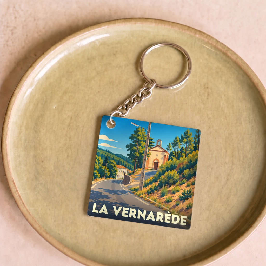 Porte-clés souvenir de la ville de La Vernarède avec une illustration stylisée.