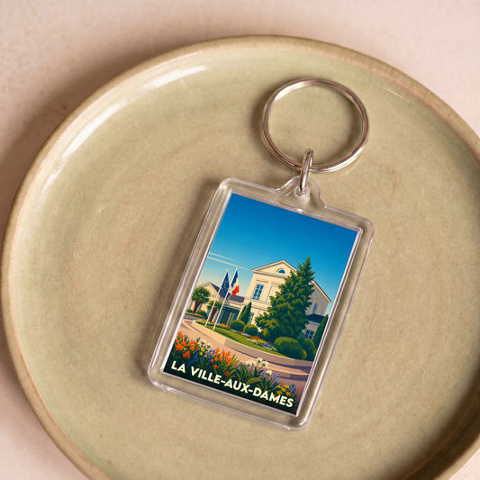 Porte-clés souvenir de la ville de La Ville-aux-Dames avec une illustration stylisée de l'hôtel de ville.