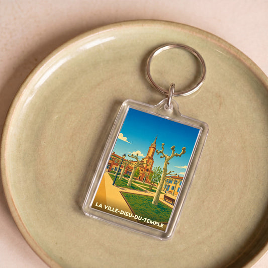 Porte-clés souvenir de la ville de La Ville-Dieu-du-Temple avec une illustration stylisée.