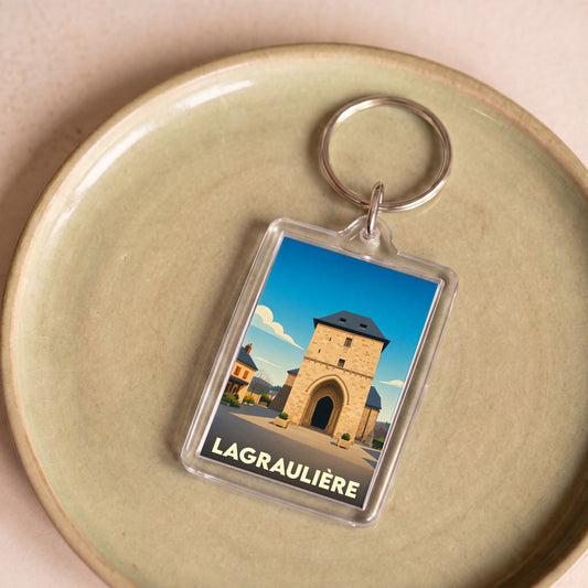 Porte-clés souvenir de la ville de Lagraulière avec une illustration stylisée.