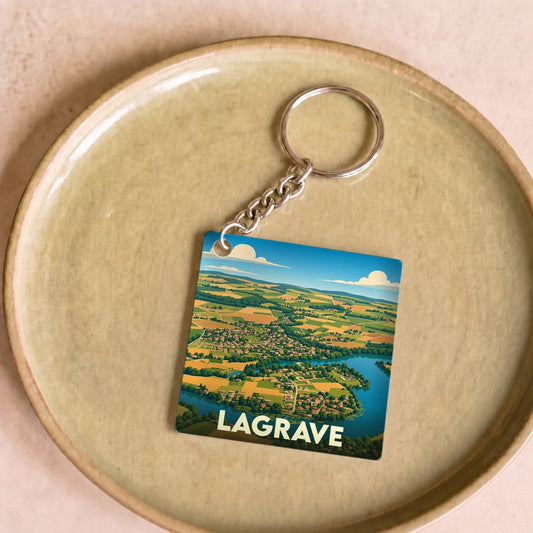 Porte-clés souvenir de la ville de Lagrave avec une illustration stylisée.