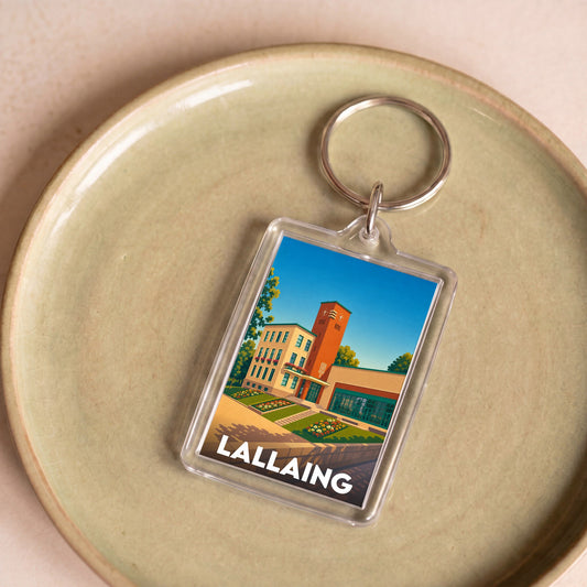 Porte-clés souvenir de la ville de Lallaing avec une illustration stylisée.