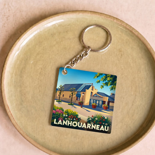 Porte-clés souvenir de la ville de Lanhouarneau avec une illustration stylisée.
