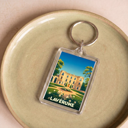 Porte-clés souvenir de la ville de Lavérune avec une illustration stylisée de son château.