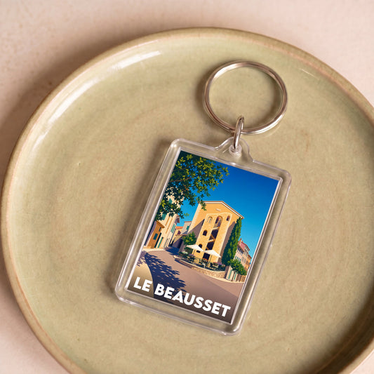 Porte-clés souvenir de la ville du Beausset avec une illustration stylisée.