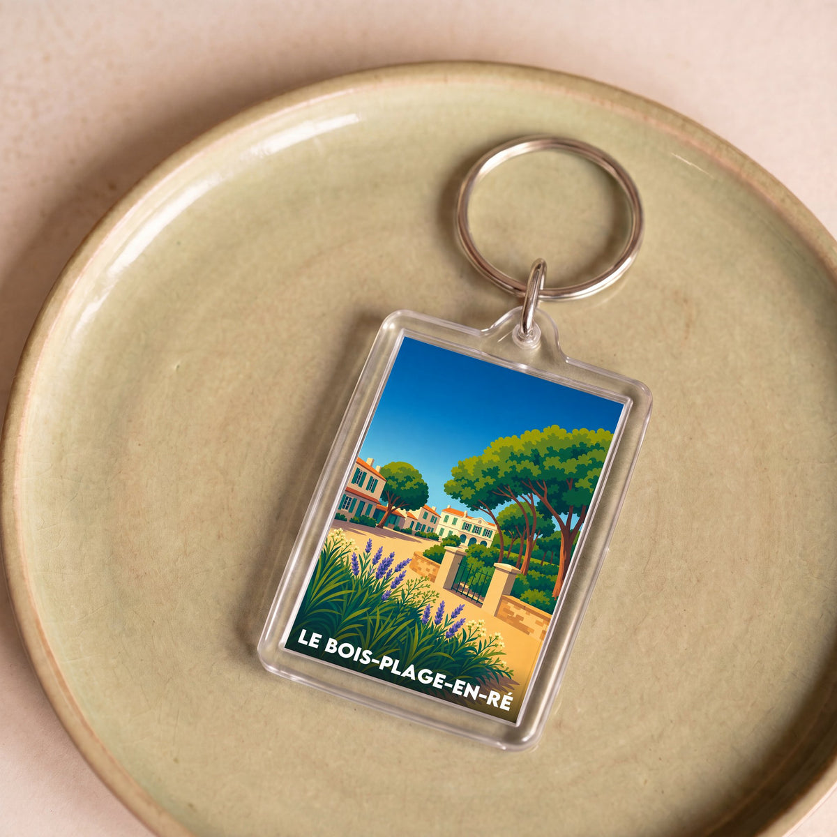 Porte-clés souvenir de la ville de Le Bois-Plage-en-Ré avec une illustration stylisée.