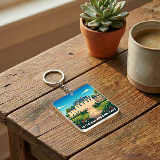 Porte-clés souvenir de la ville de Le Chesnay-Rocquencourt avec une illustration stylisée.