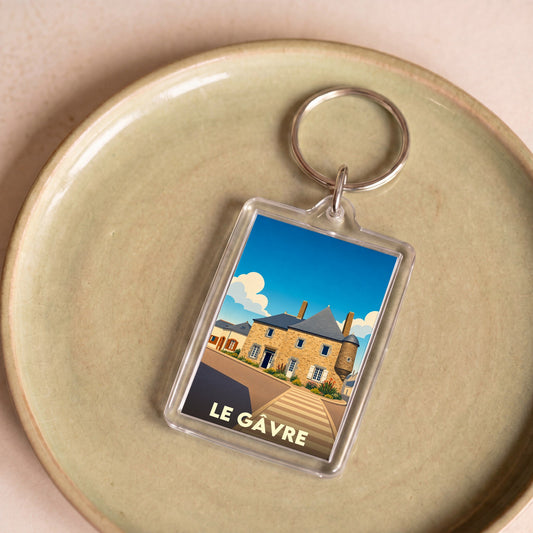 Porte-clés souvenir de la ville du Gâvre avec une illustration stylisée d'un bâtiment historique.