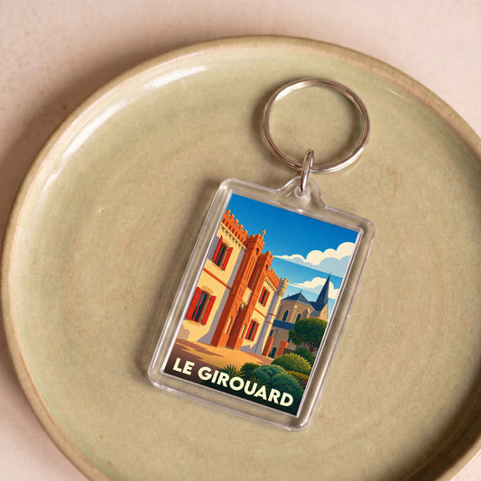 Porte-clés souvenir de la ville de Le Girouard avec une illustration stylisée.