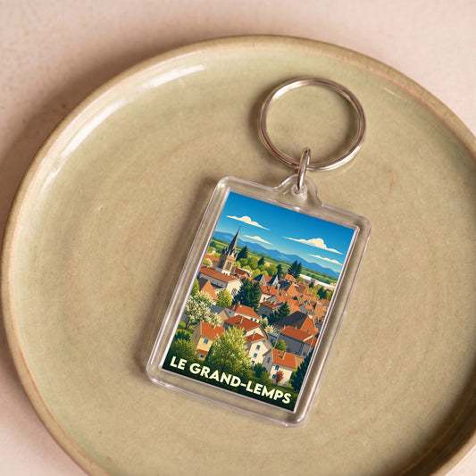 Porte-clés souvenir de la ville du Grand-Lemps avec une illustration stylisée.