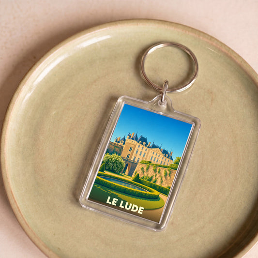 Porte-clés souvenir de la ville de Le Lude avec une illustration stylisée de son château.