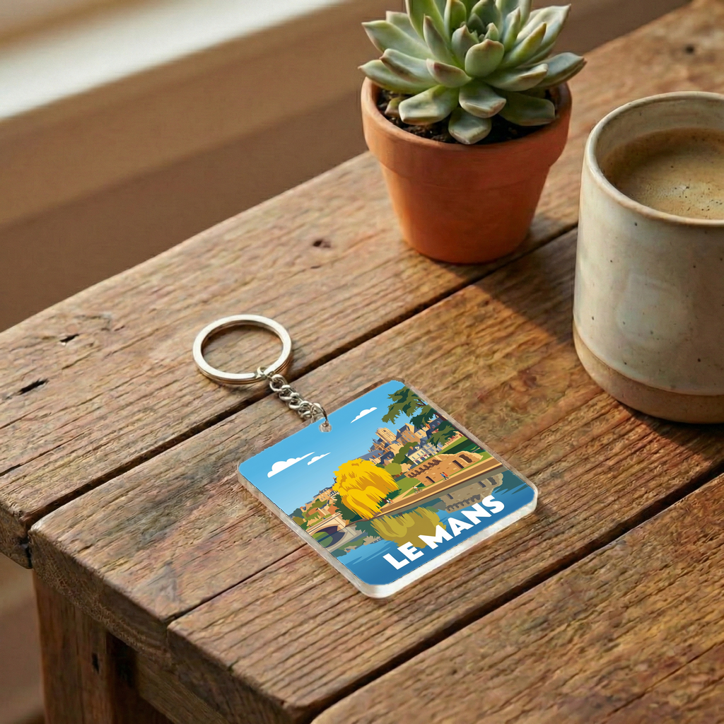 Porte-clés souvenir de la ville de Le Mans avec une illustration stylisée.