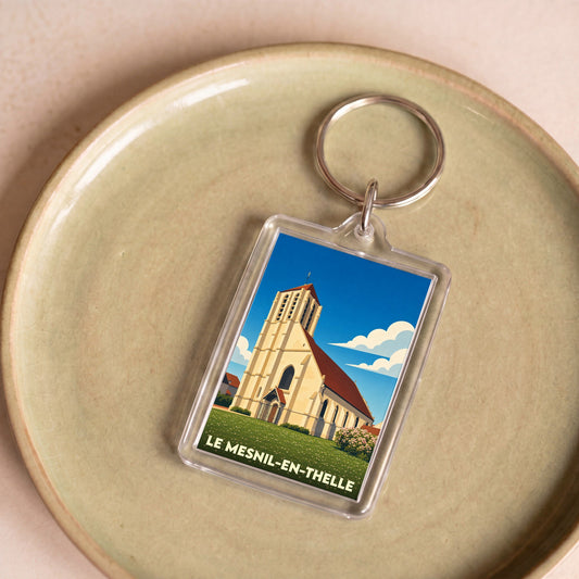 Porte-clés souvenir de la ville du Mesnil-en-Thelle avec une illustration stylisée de son église.