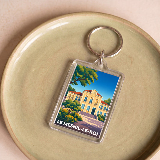 Porte-clés souvenir de la ville de Le Mesnil-le-Roi avec une illustration stylisée de sa mairie.
