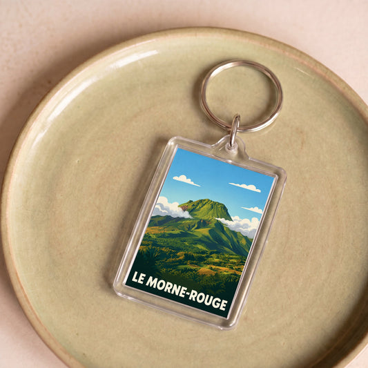 Porte-clés souvenir de la ville de Le Morne-Rouge avec une illustration stylisée d'un paysage de montagne.