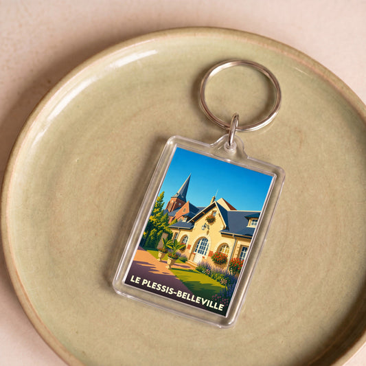 Porte-clés souvenir de la ville de Le Plessis-Belleville avec une illustration colorée et stylisée.