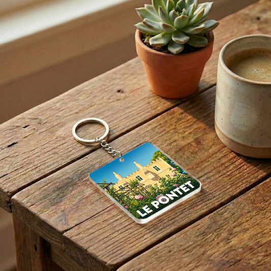 Porte-clés souvenir de la ville de Le Pontet avec une illustration stylisée.