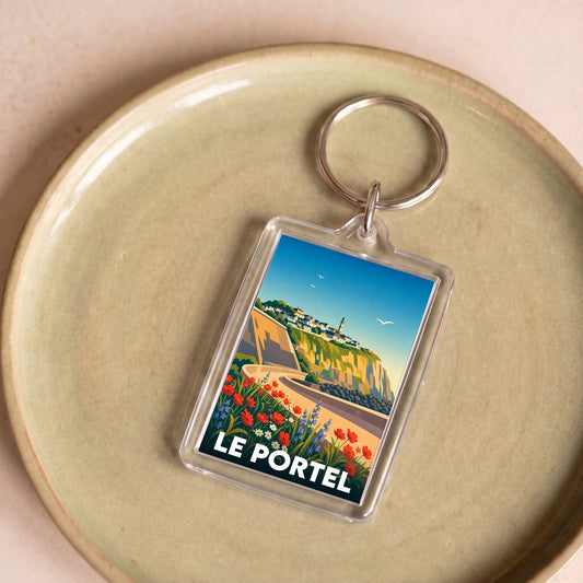 Porte-clés souvenir de la ville de Le Portel avec une illustration stylisée.