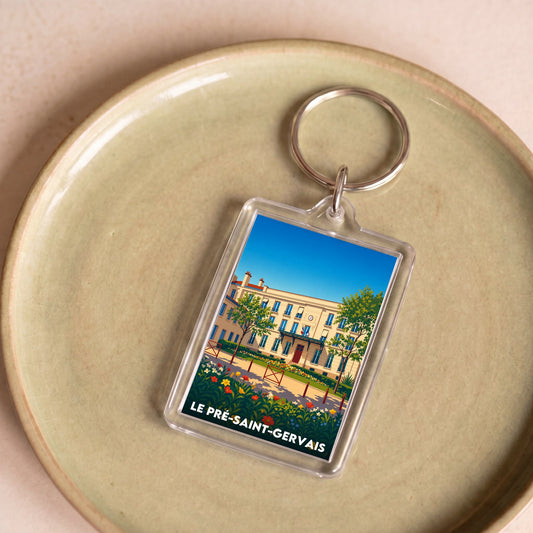 Porte-clés souvenir de la ville du Pré-Saint-Gervais avec une illustration stylisée.