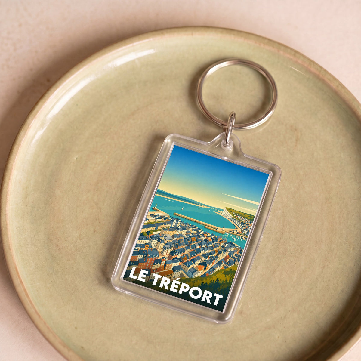 Porte-clés souvenir de la ville de Le Tréport avec une illustration stylisée.