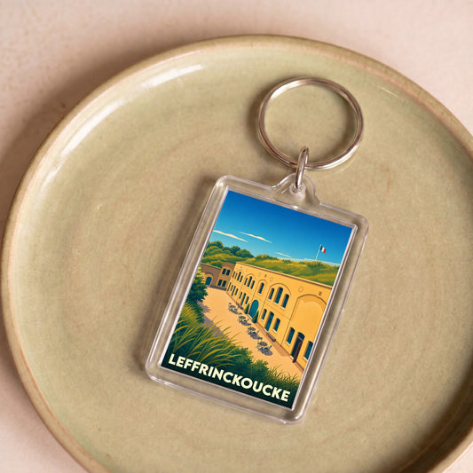 Porte-clés souvenir de la ville de Leffrinckoucke avec une illustration stylisée de son fort.