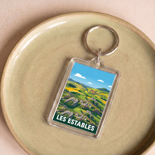 Porte-clés souvenir de la ville de Les Estables avec une illustration stylisée.