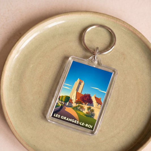 Porte-clés souvenir de la ville de Les Granges-le-Roi avec une illustration stylisée.