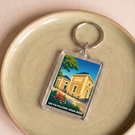Porte-clés souvenir de la ville de Les Pavillons-sous-Bois avec une illustration stylisée.