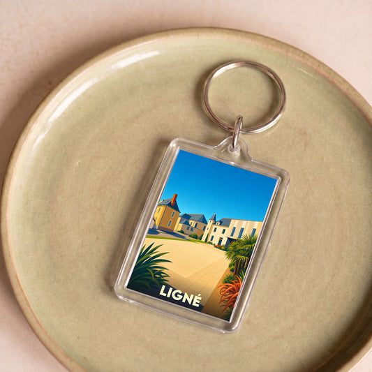 Porte-clés souvenir de la ville de Ligné avec une illustration stylisée.