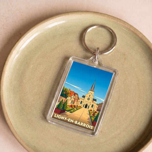 Porte-clés souvenir de la ville de Ligny-en-Barrois avec une illustration stylisée.