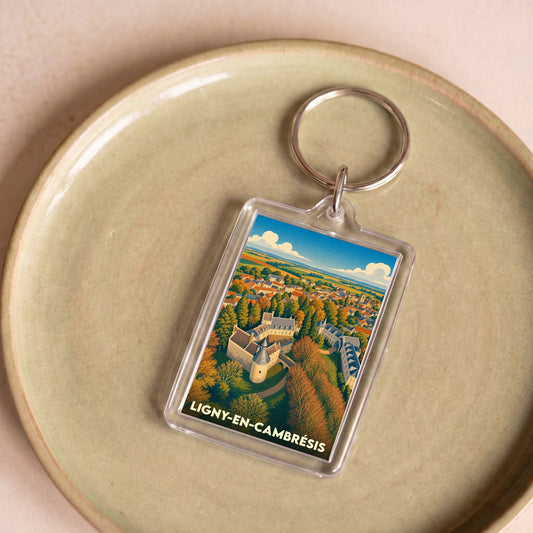 Porte-clés souvenir de la ville de Ligny-en-Cambrésis avec une illustration stylisée.