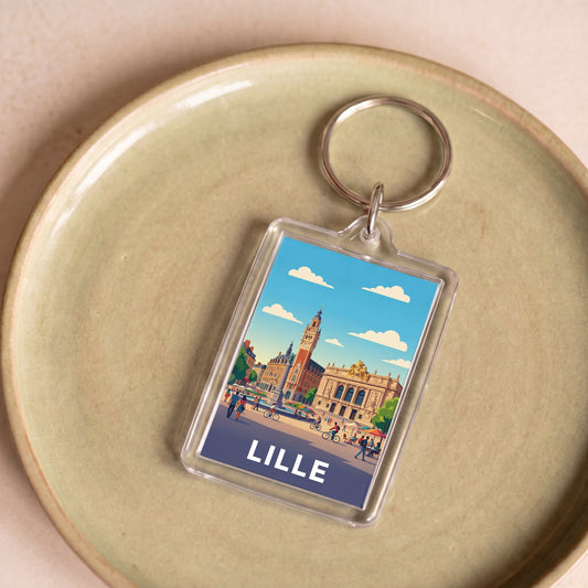 Porte-clés souvenir de la ville de Lille avec une illustration stylisée.