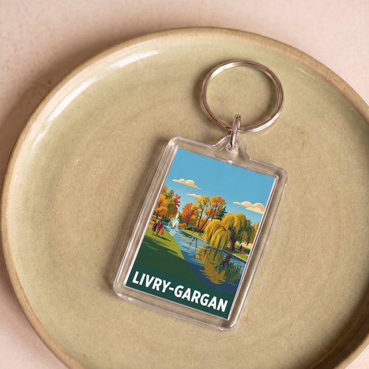 Porte-clés souvenir de la ville de Livry-Gargan avec une illustration de parc stylisée.