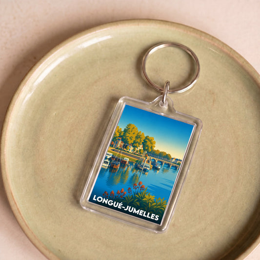 Porte-clés souvenir de la ville de Longué-Jumelles avec une illustration stylisée des bords de l'Authion.