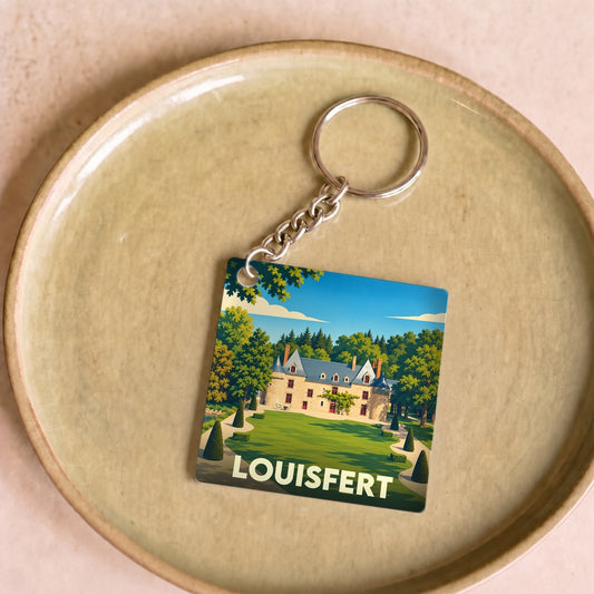 Porte-clés souvenir de la ville de Louisfert avec une illustration stylisée de son château.