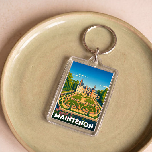Porte-clés souvenir de la ville de Maintenon avec une illustration stylisée de son château.
