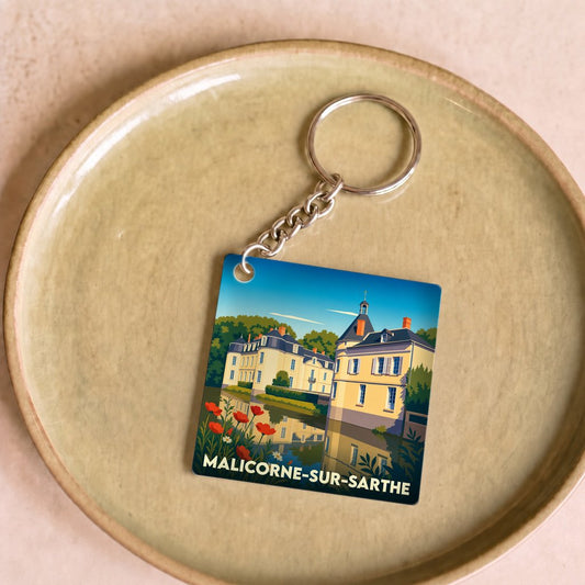 Porte-clés souvenir de la ville de Malicorne-sur-Sarthe avec une illustration stylisée de son château.