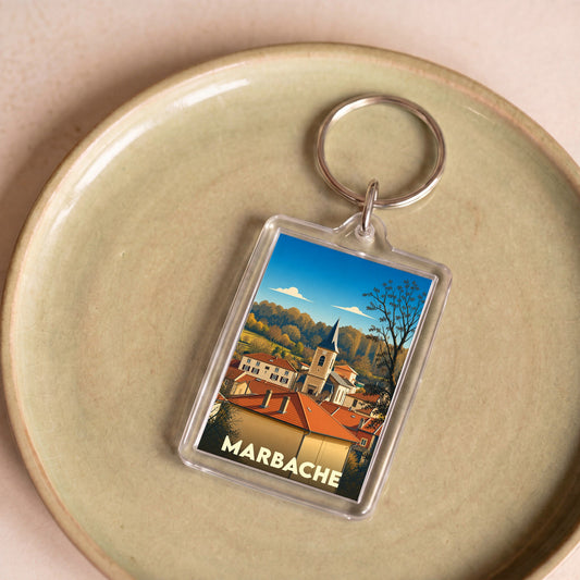 Porte-clés souvenir de la ville de Marbache avec une illustration stylisée.