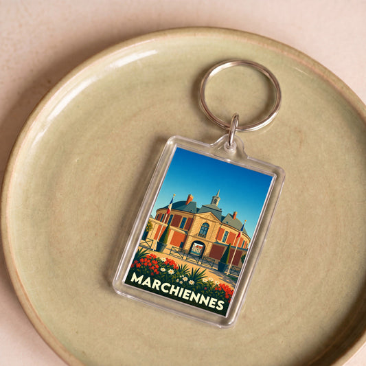 Porte-clés souvenir de la ville de Marchiennes avec une illustration stylisée de son hôtel de ville.