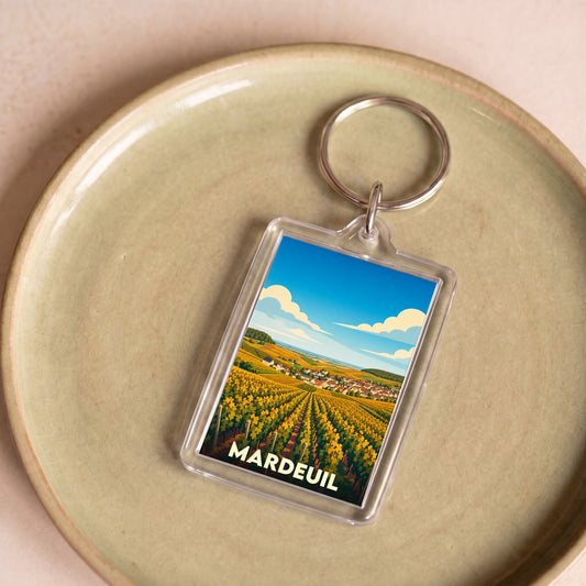 Porte-clés souvenir de la ville de Mardeuil avec une illustration stylisée de son vignoble.