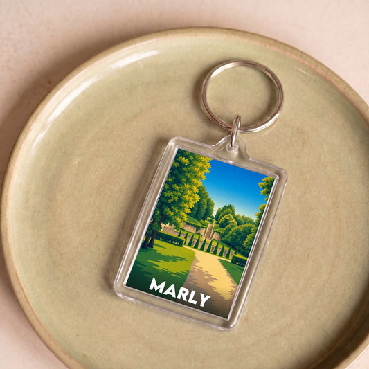 Porte-clés souvenir de la ville de Marly avec une illustration stylisée.
