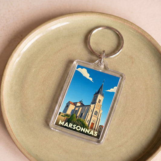 Porte-clés souvenir de la ville de Marsonnas avec une illustration stylisée de son église.
