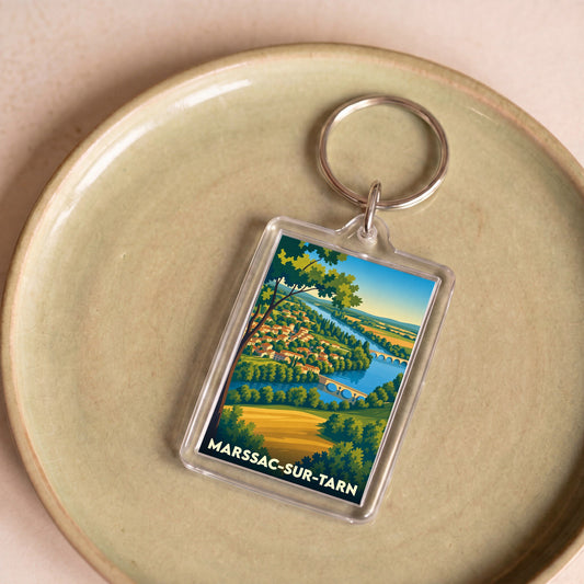 Porte-clés souvenir de la ville de Marssac-sur-Tarn avec une illustration stylisée.