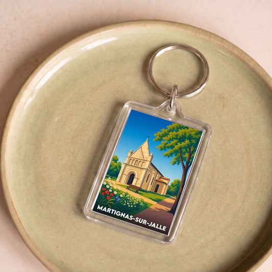 Porte-clés souvenir de la ville de Martignas-sur-Jalle avec une illustration stylisée.
