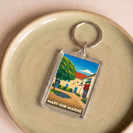 Porte-clés souvenir de la ville de Mary-sur-Marne avec une illustration stylisée.