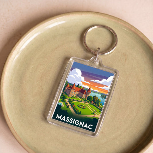 Porte-clés souvenir de la ville de Massignac avec une illustration stylisée.
