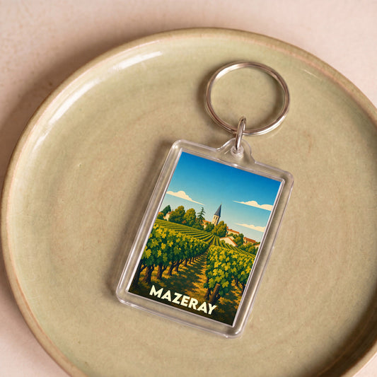 Porte-clés souvenir de la ville de Mazeray avec une illustration stylisée de ses vignes.